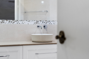 Textured basin and cabinetry